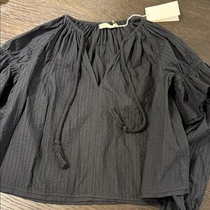 Ulla Johnson black cotton long sleeve shirt with ruffle on the sleeve